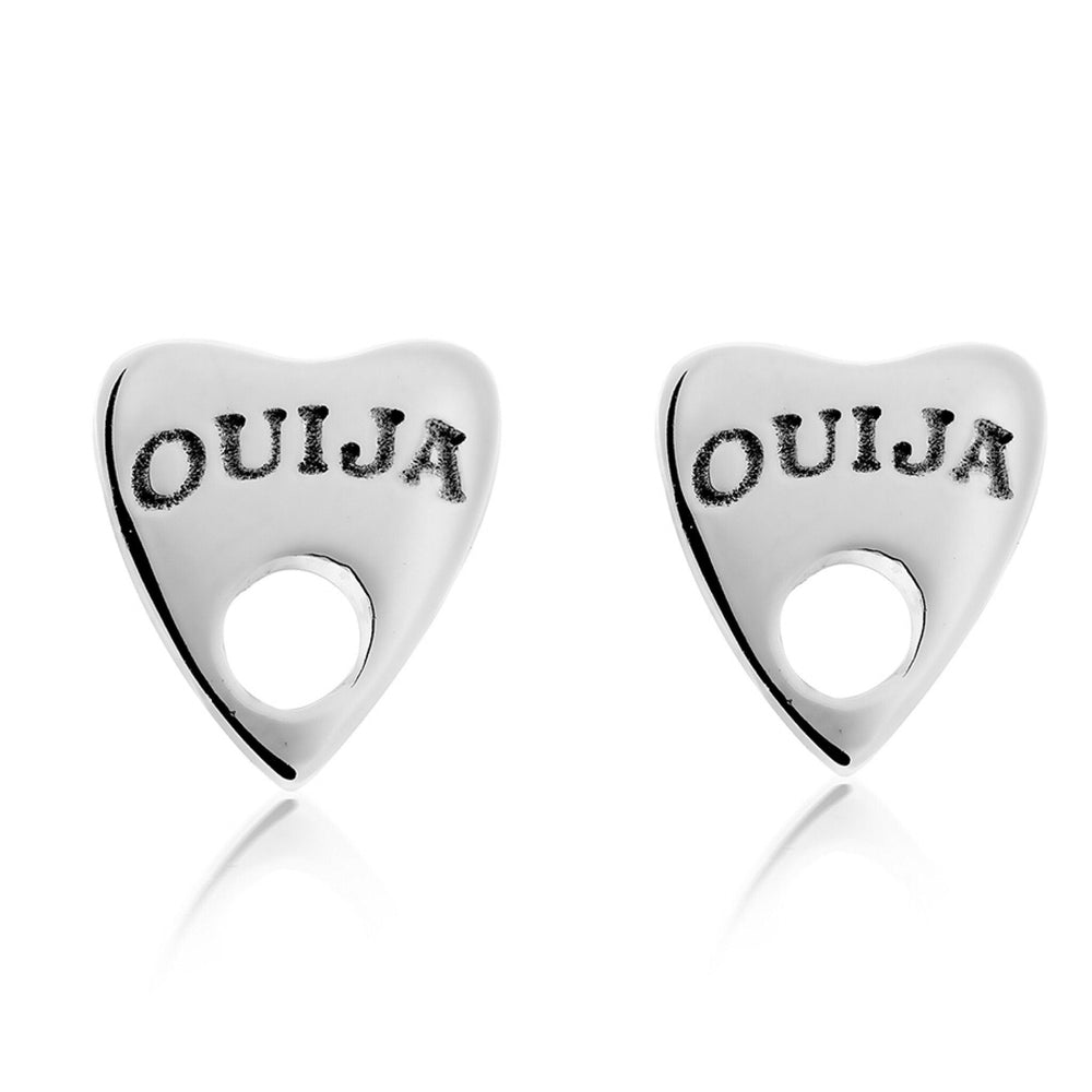 A pair of Ouija Silver Earrings by Cosmic Boulevard. Each heart-shaped earring has a hole near the pointed end and the word "Ouija" engraved near the top, with a shiny, metallic finish. This piece of handmade jewellery is perfect for mystic and stylish looks alike.