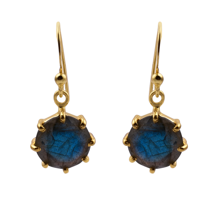 A pair of gold drop earrings featuring round, dark blue Labradorite gemstones. The stones are set in gold prongs with hooks for pierced ears. This piece of beautiful jewellery has a classic and elegant design, showcasing meticulous handmade craftsmanship. Introducing the "Labradorite Gold dangles" by Watermelon Tropical.