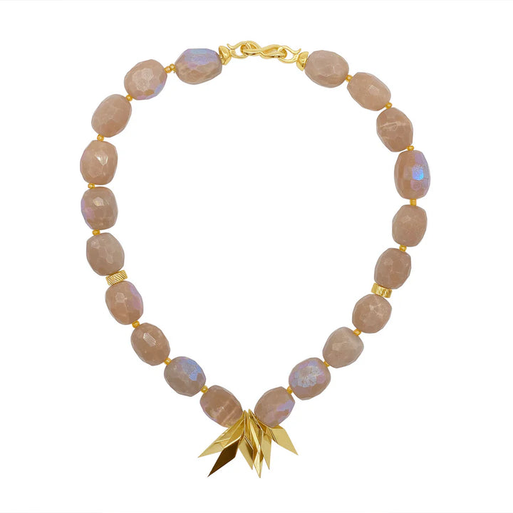 The Lotus Necklace by Aria V is a handmade beaded necklace with light brown faceted sunstone beads, gold accents, a gold clasp, and geometric gold charms as a pendant—crafted in Dublin.