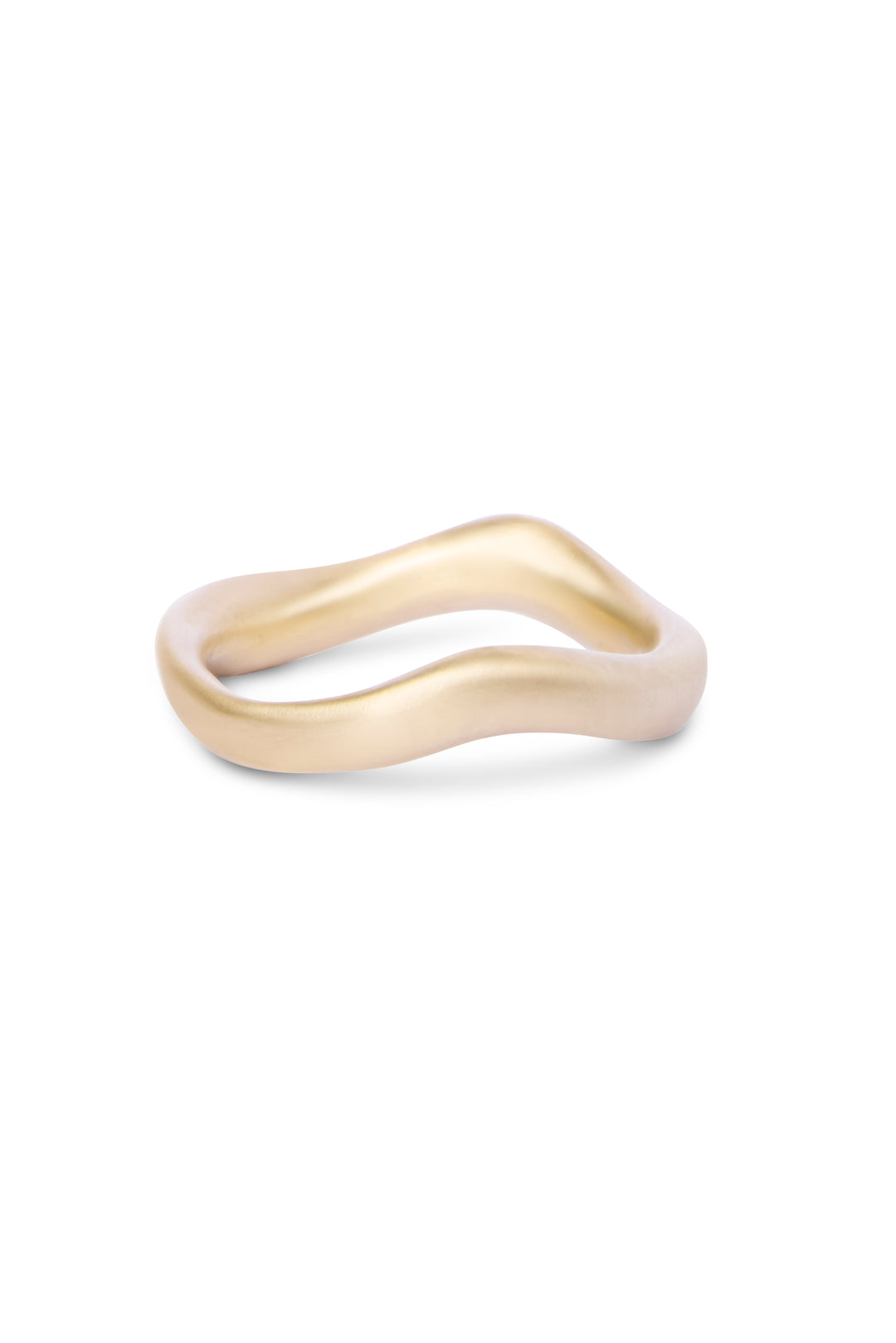 The Thorn Ring by Madeleine Sculptural Jewellery is a thin, wavy gold ring with a matte finish, expertly crafted from recycled brass and displayed on a white background.