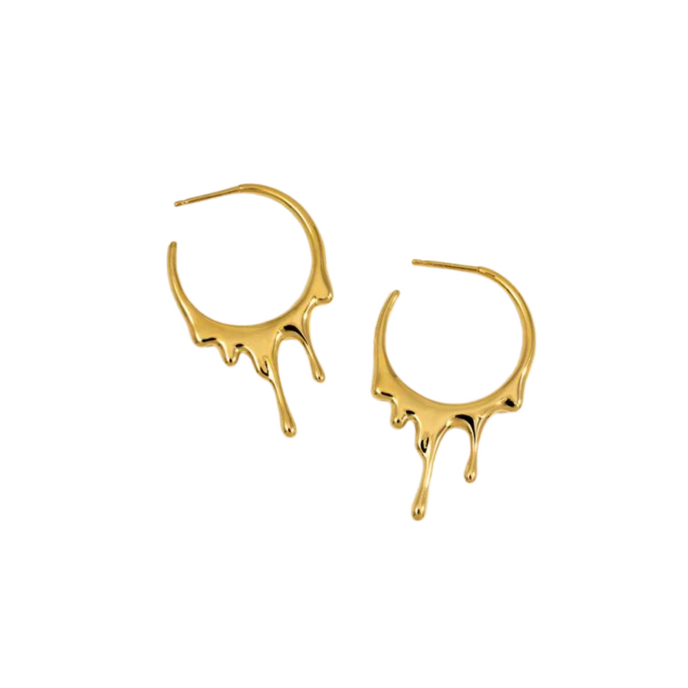 A pair of Gold Dripping Circular S Hoop Earrings from Marie June Jewellery with a unique design where the bottom part appears to be melting, forming drips that hang down. Crafted from 18K yellow gold, the earrings feature a polished, shiny finish.