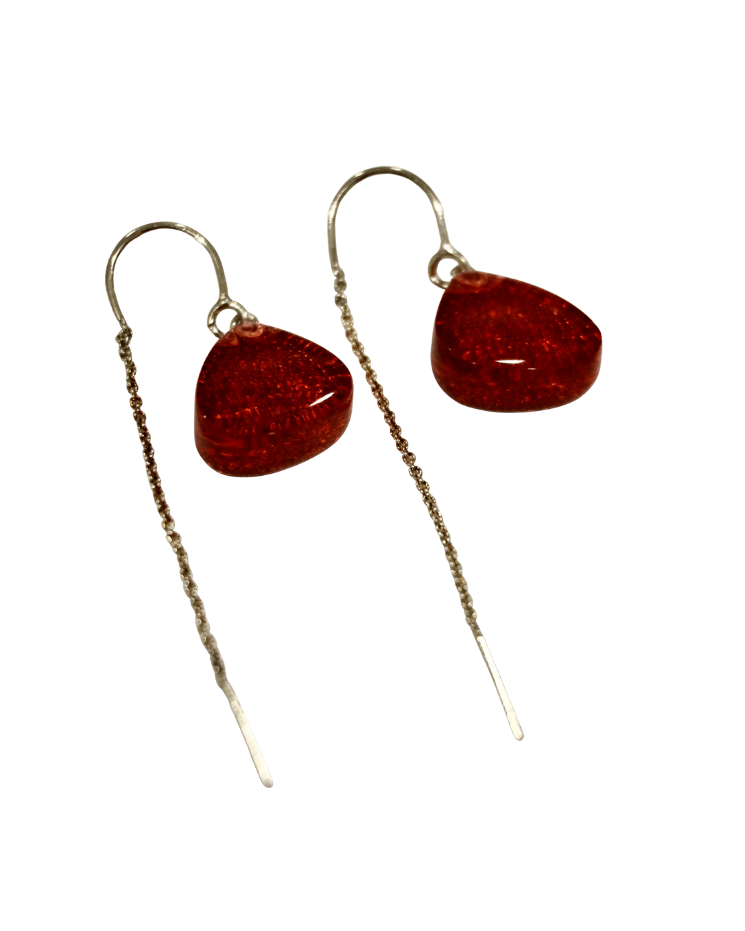 A pair of MX.design Acrylic Rust Earrings with chain back in gold, featuring triangular red pendants in rich amber tones, isolated on a white background.