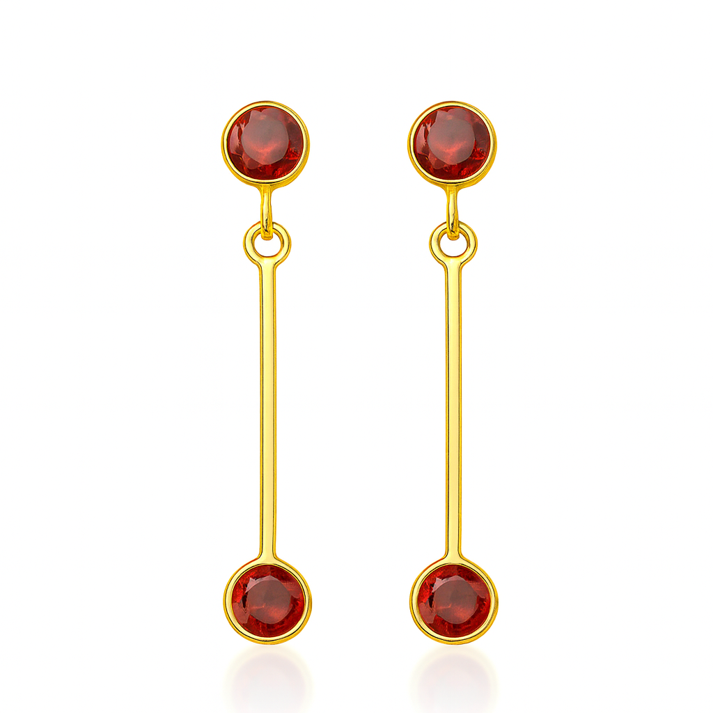 Watermelon Tropical’s Pink Tourmaline & Garnet Drop Earrings feature a minimalist linear design, handcrafted in gold-plated sterling silver with pink tourmaline and garnet stones linked by a slim vertical gold bar.