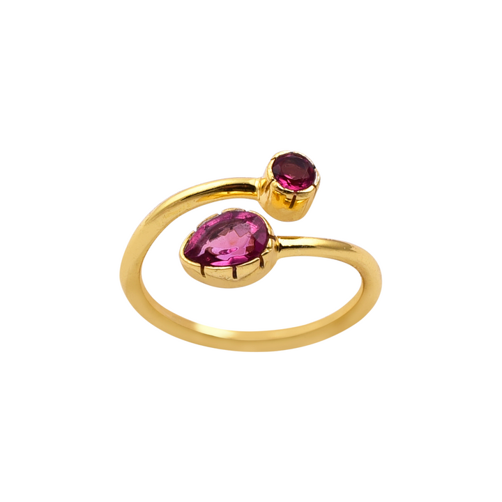 The Watermelon Tropical Pink Quartz Gold Snake Ring features an open band design with two Pink Quartz gemstones. One gemstone is larger and oval-shaped, while the other is smaller and round. The stones are set at opposite ends of the band, giving this piece of handmade jewellery a modern and elegant appearance.