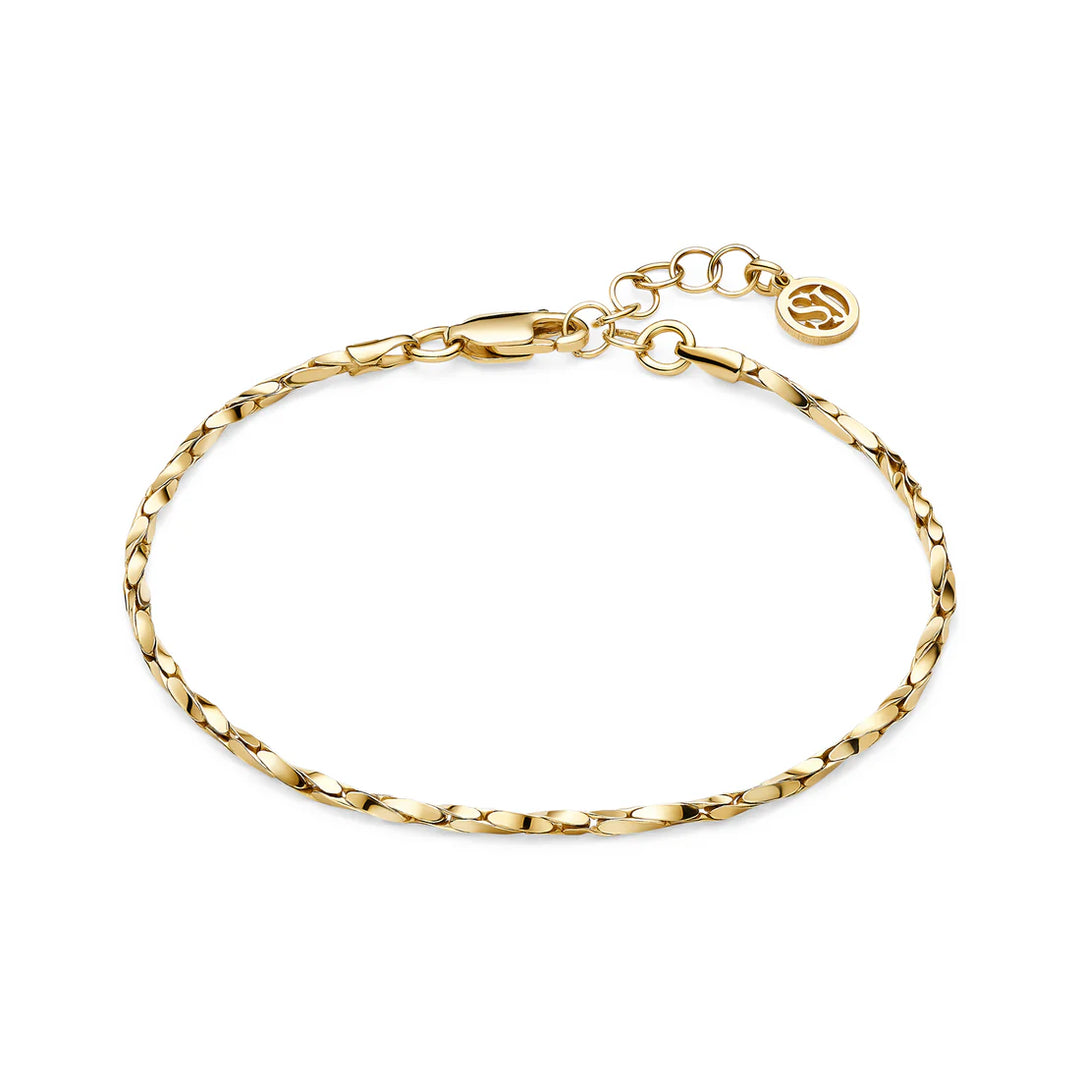 The Savona Bracelet by Sif Jacobs features flat, twisted links in 18k gold-plated rhodium 925 sterling silver, an adjustable clasp, and a small round charm near the clasp.
