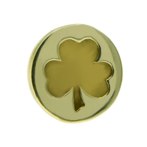 A Millett Wade Shamrock Lapel Pin is a circular gold pin featuring a cut-out shape of a three-leaf clover in the center. The clover design is symmetrical, and the polished surface with high-quality metal lacquer gives the solid brass lapel pin a shiny appearance.