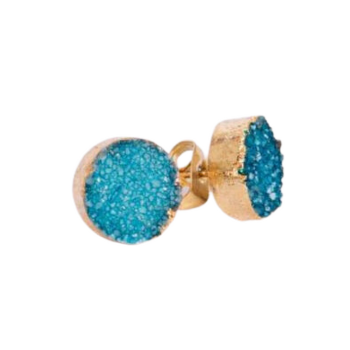 The Watermelon tropical Teal Blue Druzy Set In Gold Stud Earrings have a gold vermeil base, featuring round, textured teal blue druzy stone centers. The earrings have a rough, crystalline appearance and a shiny, polished gold border.