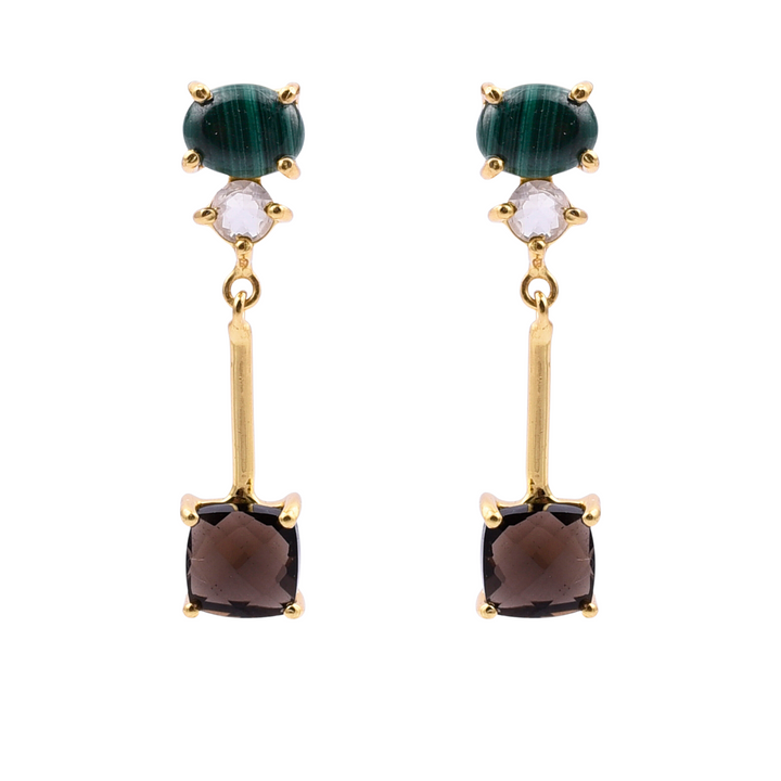 The Triple Gemstone Dangle Earrings by Watermelon Tropical are a pair of elegant drop earrings featuring a combination of semi-precious stones set in gold vermeil. Each handmade earring has a round green stone at the top, a smaller white gemstone below it, and a square brown gemstone hanging at the end of a gold bar.