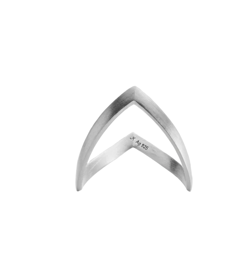 A minimalist Jane Koenig V Ring crafted from sterling silver with a matte finish, featuring a small “10 925” engraving on the inside, photographed against a plain white background.