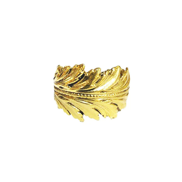 A gold-plated brass ring designed to resemble a feather, with intricate detailing and layered segments creating a textured, elegant look. The ring's open design allows for adjustable sizing. Made in Paris, the background is white, highlighting the Coco Feather Ring Gold by Lotta et Djossou's features.