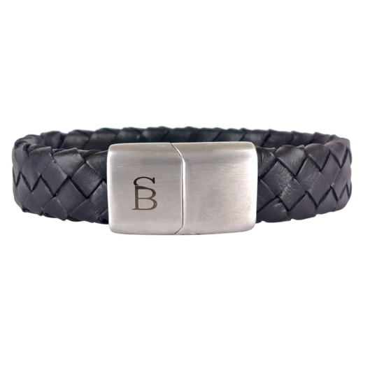 A black leather braided bracelet featuring a stainless steel rectangular magnetic clasp engraved with the letters "B B." Made from genuine leather, the single wrap bracelet boasts a rugged yet sophisticated appearance. Preston - Matt Black by Steel and Barnett.