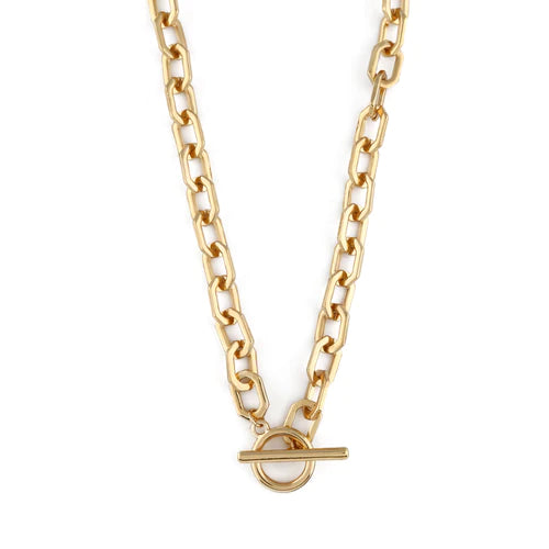 A Geo Open Link T-Bar Necklace - Gold featuring large, rectangular links arranged in a uniform pattern. This chunky link chain necklace by Orelia London has a stylish and secure toggle clasp at the front, with a horizontal bar connected to a circular loop for an elegant t-bar fastening.