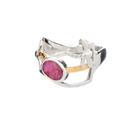A unique silver & gold plate ring featuring an asymmetrical band design with a contrasting gold accent. At the center of this adjustable ring is a prominent, round pink gemstone held in place by an intricate metal setting. The overall design is modern and artistic, reminiscent of the Small Dragonfly Ring in various gemstones by Gallardo & Blaine Designs.
