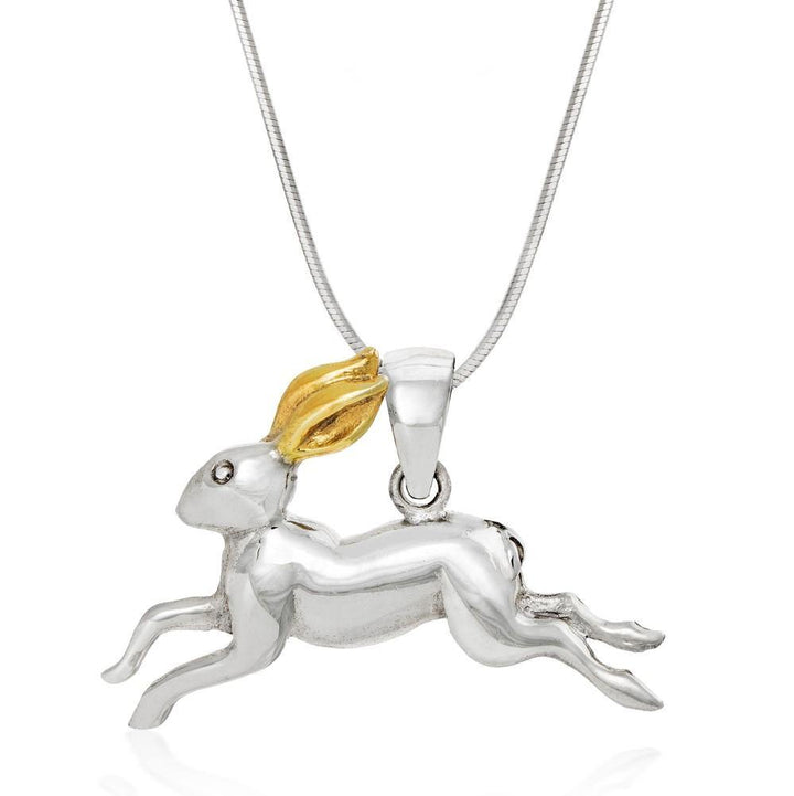 A Gallardo & Blaine Designs Wildlife Pendant - Hare With Chain in the shape of a leaping rabbit, part of our Wildlife Collection, with 18ct hard gold plating on its ears. It hangs from a thin silver chain necklace. The hare is detailed with visible legs and a tail, and the pendant is polished with a shiny finish.