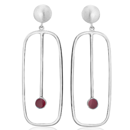 Introducing the Lorelei Earrings Large in various gemstones by Gallardo & Blaine Designs: a stunning pair of silver dangle earrings. Each earring features a hollow, elongated oval shape with a thin vertical line extending from the top center. At the end of the line is a small round red gemstone. The top of each earring has a round silver stud.