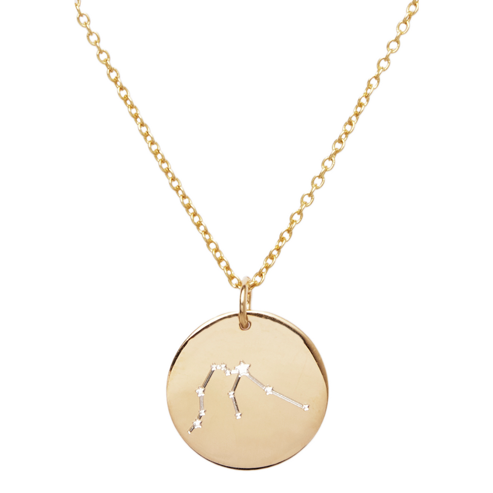 Gold constellation engraved disc