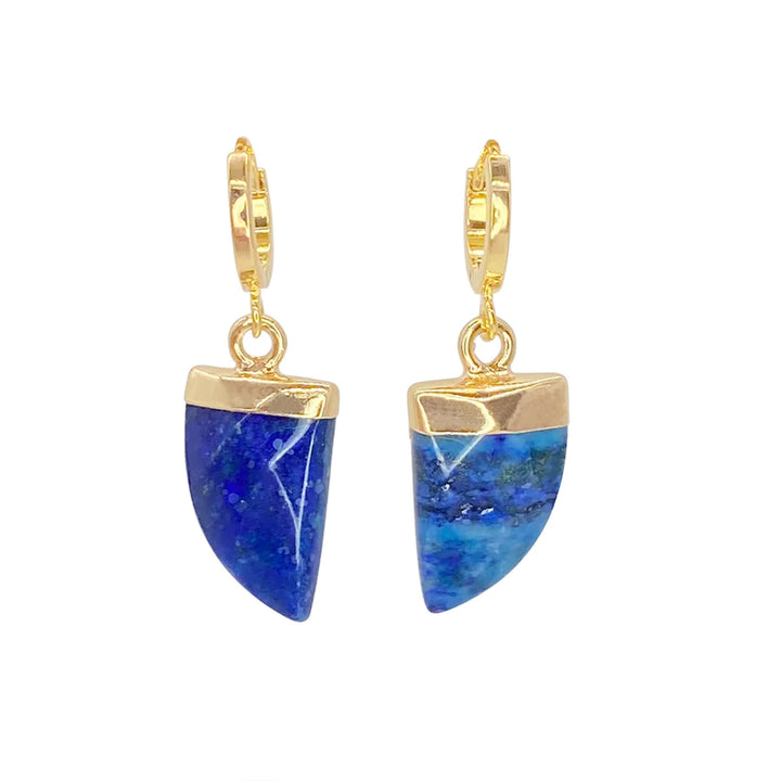 A pair of gold-plated leverback Siren Earrings by Aria V with vibrant blue semi-precious stone pendants in a triangular shape, giving a modern and stylish look.