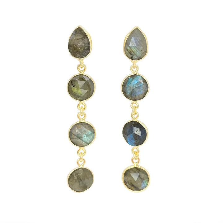 The **Chloe Earrings** by **Aria V** feature four vertically aligned labradorite stones in varying shades of gray and blue. The handcrafted stones are set in gold-plated brass bezels and connected by small gold-toned links. The top stone is teardrop-shaped, followed by three round stones.