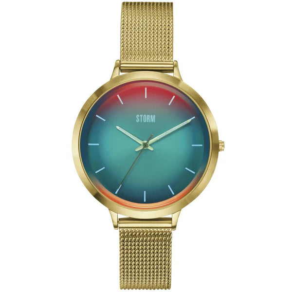 A stylish wristwatch with a gold mesh strap and a gold case. The round dial, adorned with photochromic glass, features a gradient color scheme transitioning from red at the top to turquoise at the bottom. Minimalist white hour markers and slim gold hands complete its look. The brand "Storm Watches" is displayed on the dial of the Storm Mini Styro Gold Turquoise.