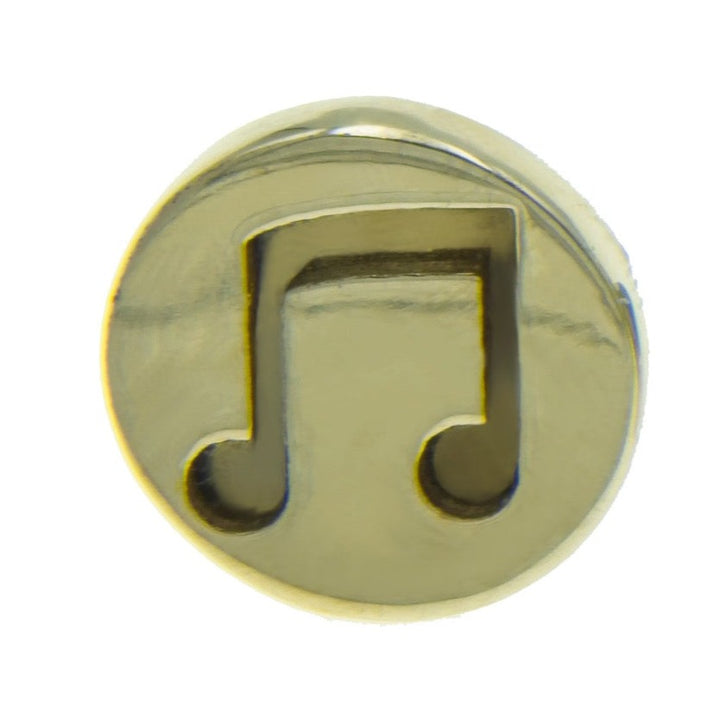 A custom pin featuring a gold-colored round design with an embossed single eighth note in the center. The Millett Wade Music Note Lapel Pin boasts a slightly reflective surface, giving it a shiny and elegant appearance.